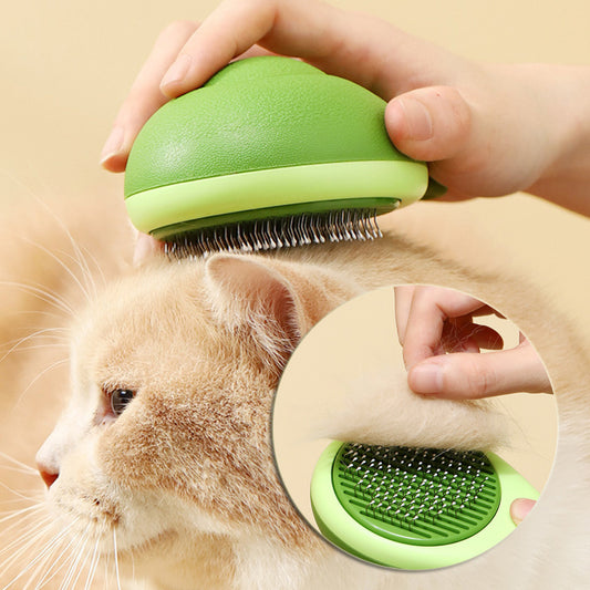 Cat being brushed with avocado-shaped grooming tool


